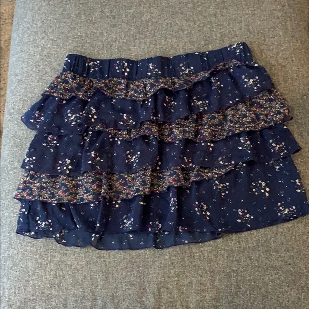 Size medium navy skirt with floral accents